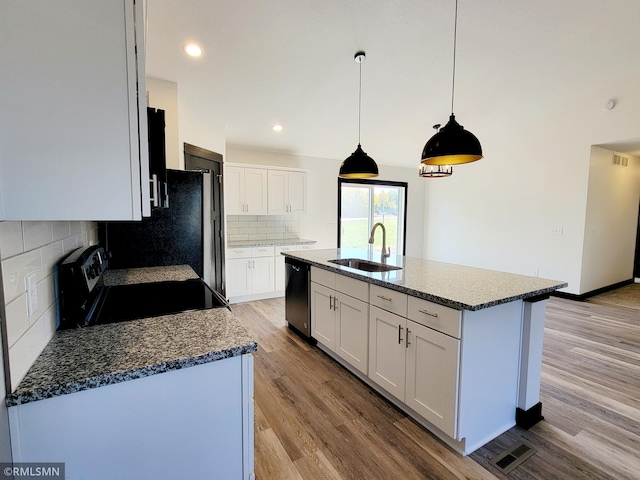 217 Bouldercrest Ave NE, Owatonna, MN 55060 - kitchen featuring electric range oven, dishwasher, light wood finished floors, tasteful backsplash, and white cabinetry