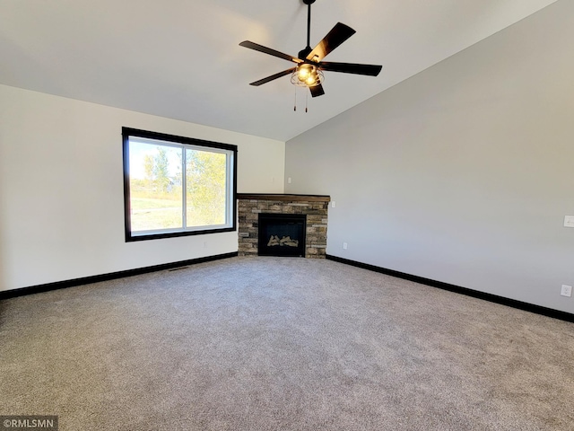 217 Bouldercrest Ave NE, Owatonna, MN 55060 - unfurnished living room with carpet flooring, a fireplace, high vaulted ceiling, and a ceiling fan