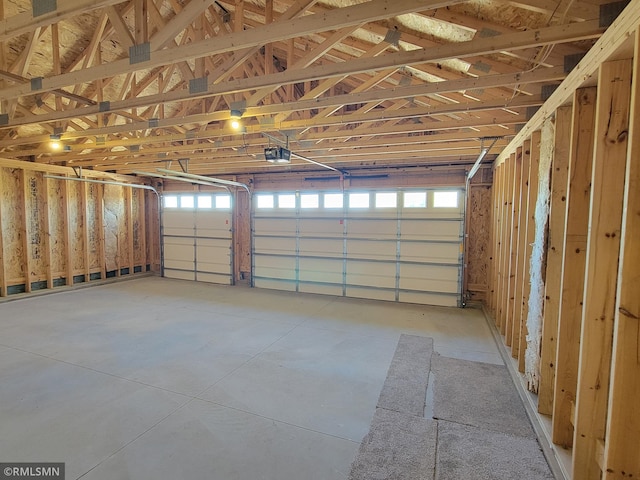 217 Bouldercrest Ave NE, Owatonna, MN 55060 - garage with a garage door opener
