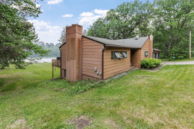 view of outbuilding featuring a water view