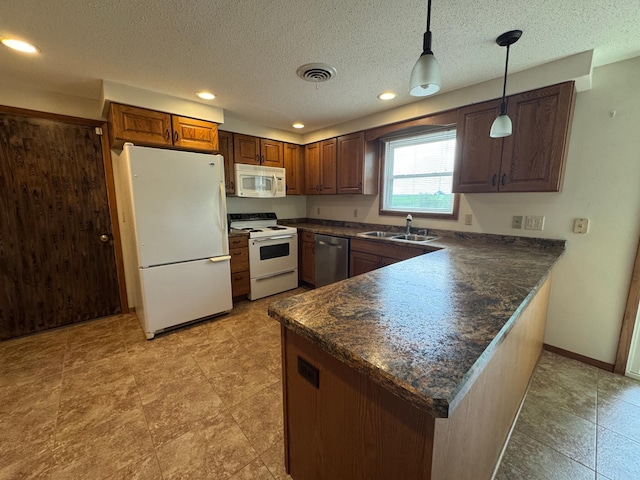 1572 County Road 4, Island Lake Twp, MN 56157 - kitchen featuring white appliances, dark countertops, a peninsula, pendant lighting, and recessed lighting