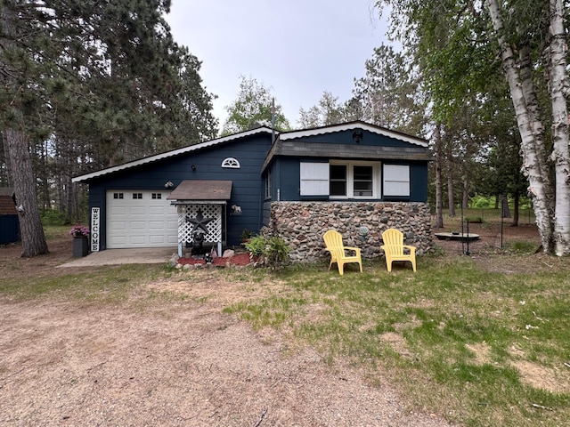 36434 145th Ave, Blueberry Twp, MN 56464 - view of front of property with driveway, a garage, and stone siding