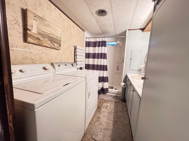 36434 145th Ave, Blueberry Twp, MN 56464 - laundry area featuring washer and clothes dryer and wallpapered walls