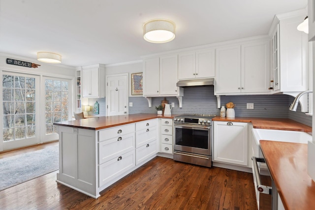 4022 Hillcrest Rd, Deephaven, MN 55391 - kitchen featuring butcher block counters, stainless steel range, under cabinet range hood, white cabinetry, and a peninsula