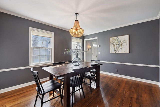 4022 Hillcrest Rd, Deephaven, MN 55391 - dining space with a chandelier, crown molding, and wood finished floors