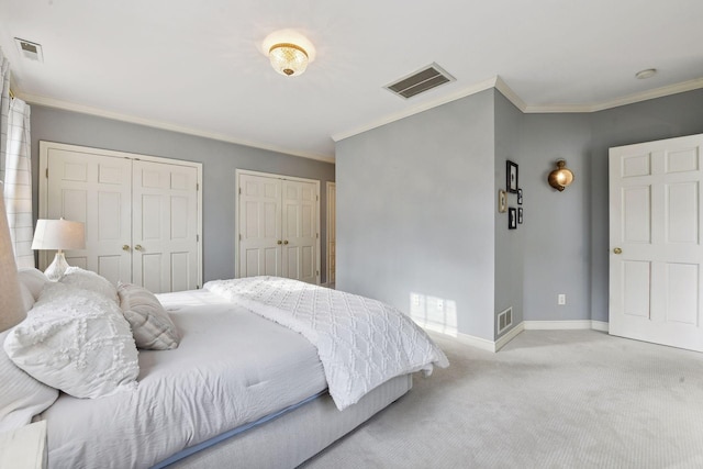 4022 Hillcrest Rd, Deephaven, MN 55391 - carpeted bedroom featuring multiple closets and ornamental molding