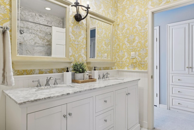 4022 Hillcrest Rd, Deephaven, MN 55391 - full bath featuring wallpapered walls, double vanity, wainscoting, and recessed lighting