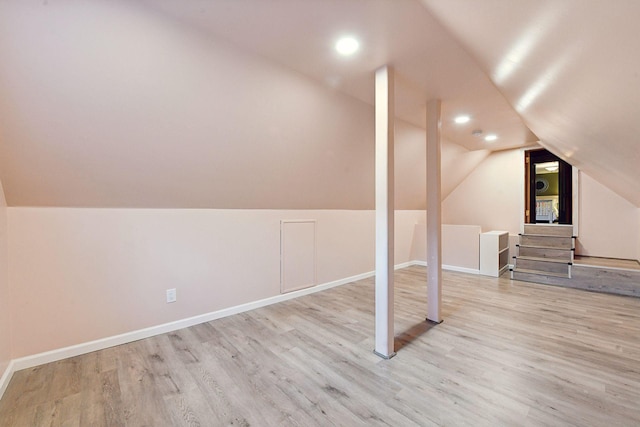 4022 Hillcrest Rd, Deephaven, MN 55391 - bonus room with vaulted ceiling, wood finished floors, recessed lighting, and stairway