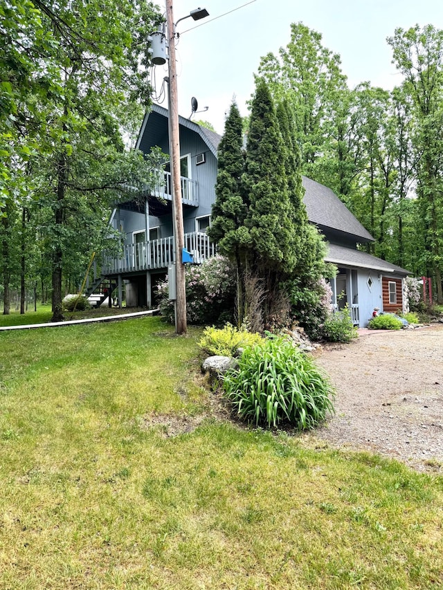 42863 270th St, Malung Twp, MN 56751 - back of house with a lawn and driveway