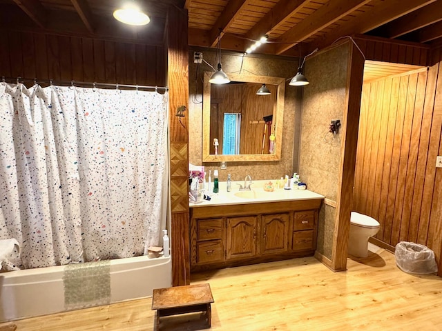 42863 270th St, Malung Twp, MN 56751 - full bath featuring vanity, shower / bath combination with curtain, and wood finished floors