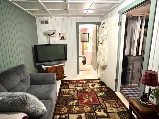 42863 270th St, Malung Twp, MN 56751 - living area featuring coffered ceiling and wood walls