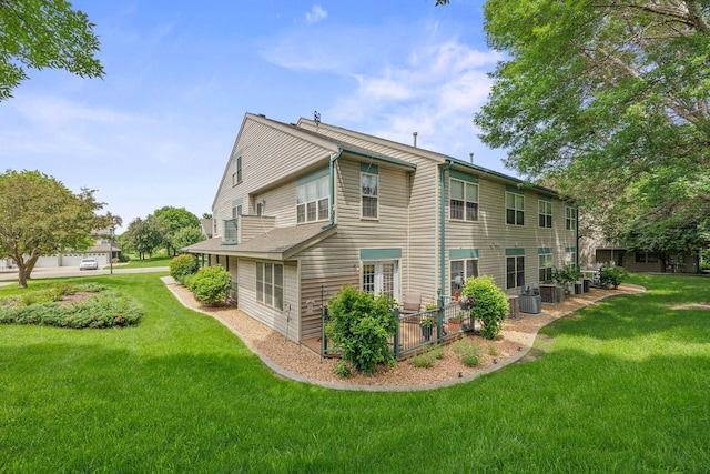 119 Morningside Dr NE, Hutchinson, MN 55350 - view of property exterior featuring a yard and a patio area