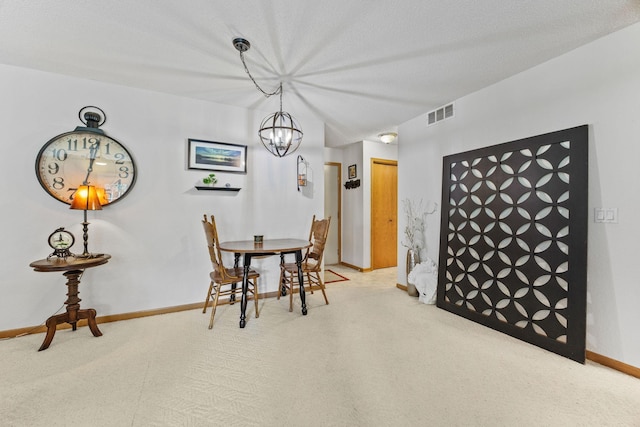119 Morningside Dr NE, Hutchinson, MN 55350 - carpeted dining space featuring a chandelier and baseboards