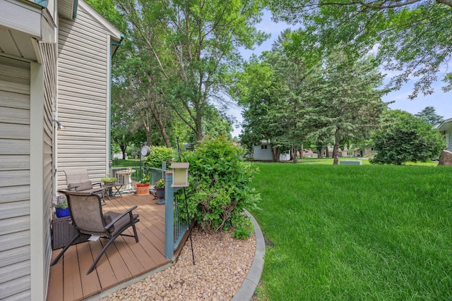 119 Morningside Dr NE, Hutchinson, MN 55350 - view of green lawn featuring a deck