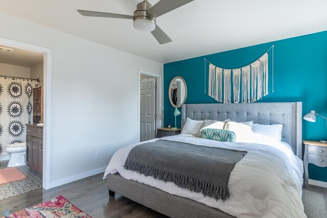 7339 21st St S, Fargo, ND 58104 - bedroom featuring wood finished floors, ceiling fan, and ensuite bathroom
