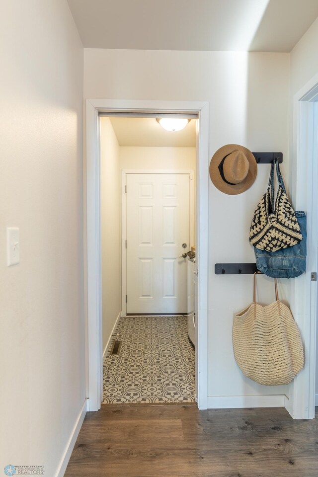 7339 21st St S, Fargo, ND 58104 - doorway to outside with baseboards and wood finished floors