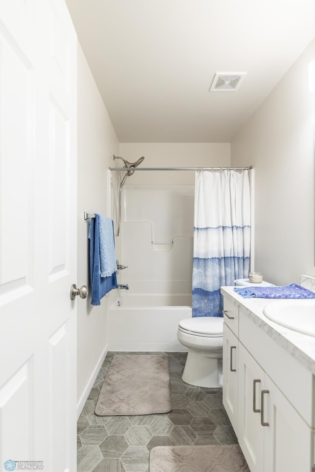 7339 21st St S, Fargo, ND 58104 - bathroom with vanity, shower / bathtub combination with curtain, and tile patterned flooring