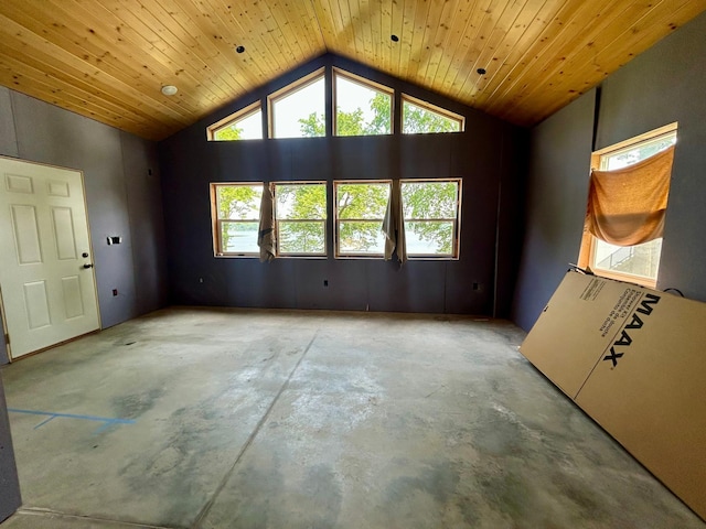 13648 Island Lake Rd W, Lengby, MN 56651 - empty room with concrete floors and lofted ceiling