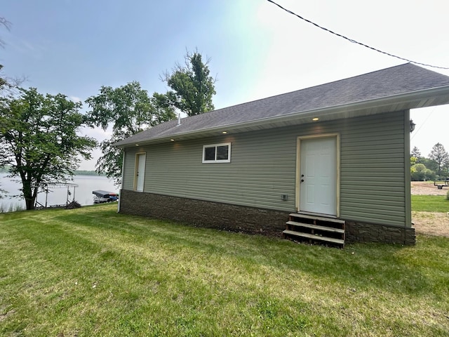 13648 Island Lake Rd W, Lengby, MN 56651 - rear view of property featuring entry steps, a lawn, and a shingled roof