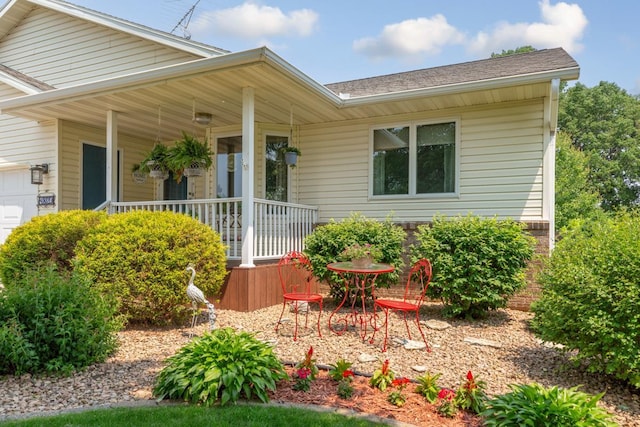 4820 Echo Ct, Faribault, MN 55021 - view of front of property with covered porch and a shingled roof