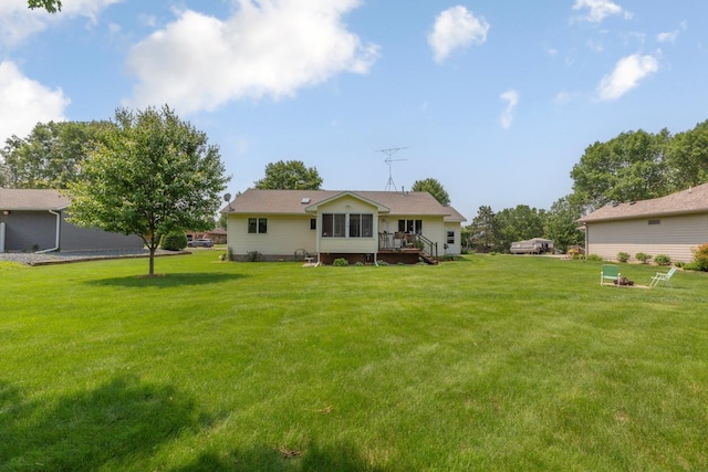 4820 Echo Ct, Faribault, MN 55021 - rear view of property featuring a yard and a wooden deck