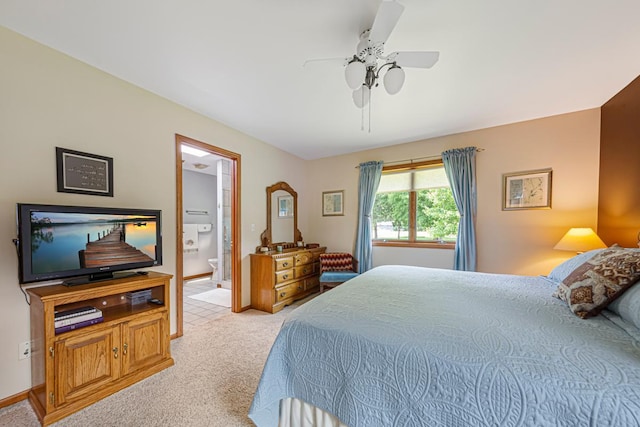 4820 Echo Ct, Faribault, MN 55021 - bedroom with light carpet, ensuite bathroom, and a ceiling fan
