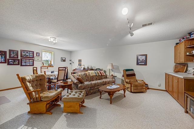 4820 Echo Ct, Faribault, MN 55021 - living room with light carpet and a textured ceiling