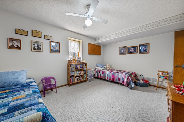 4820 Echo Ct, Faribault, MN 55021 - carpeted bedroom with a textured ceiling and ceiling fan