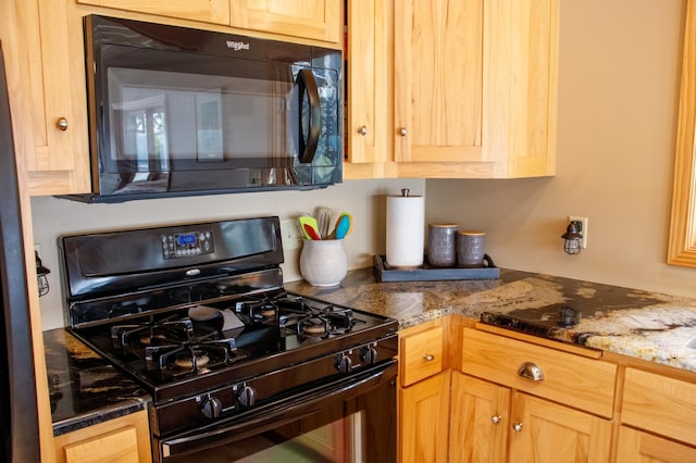 36945 Delta Bay Rd, Pine River, MN 56474 - kitchen with black appliances, light brown cabinets, and stone countertops