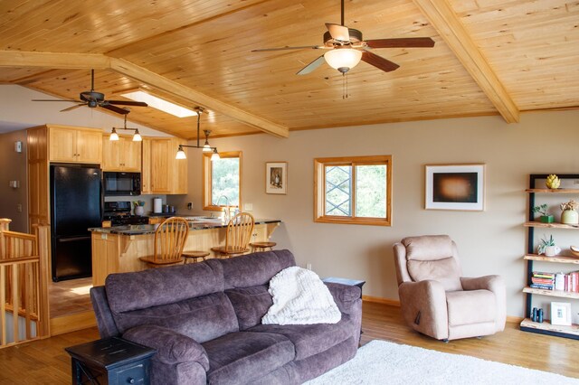 36945 Delta Bay Rd, Pine River, MN 56474 - living room with a ceiling fan, wood ceiling, and wood finished floors