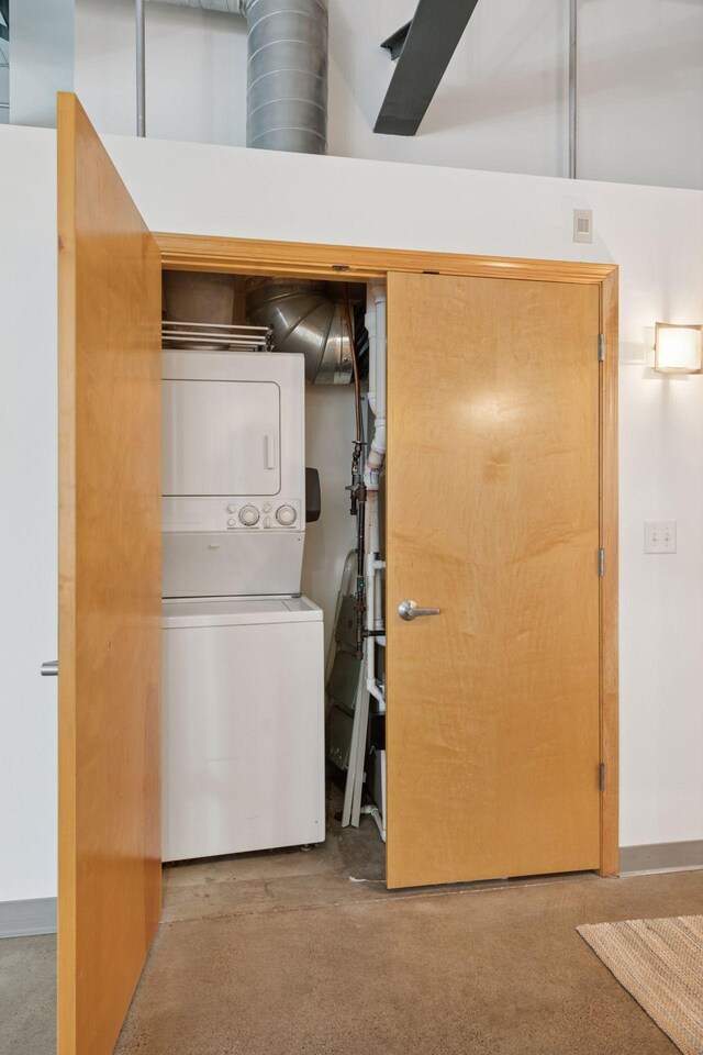 111 Franklin Ave Unit 215, Minneapolis, MN 55404 - laundry room featuring stacked washing machine and dryer