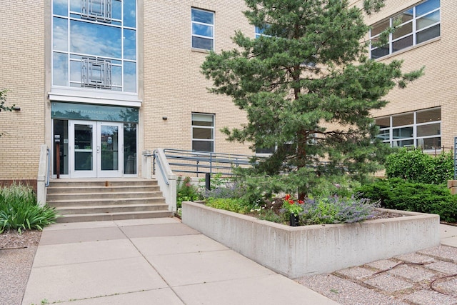 111 Franklin Ave Unit 215, Minneapolis, MN 55404 - entrance to property featuring french doors and brick siding