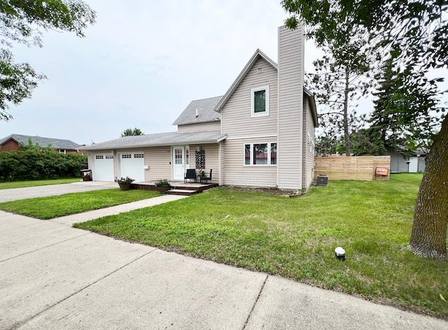 534 Main St, Perham, MN 56573 - traditional-style home with a garage, driveway, a chimney, and a shingled roof