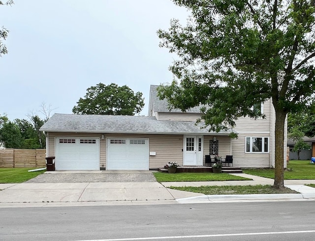 534 Main St, Perham, MN 56573 - view of front of home featuring driveway and an attached garage