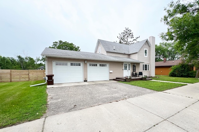 534 Main St, Perham, MN 56573 - traditional home featuring an attached garage, driveway, a chimney, and roof with shingles