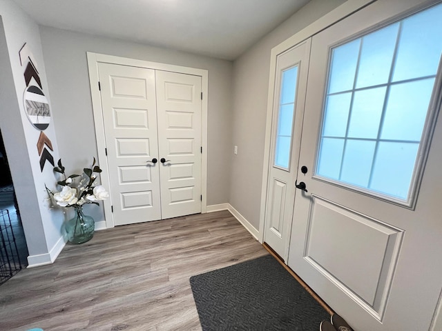 534 Main St, Perham, MN 56573 - foyer entrance with light wood-type flooring and baseboards