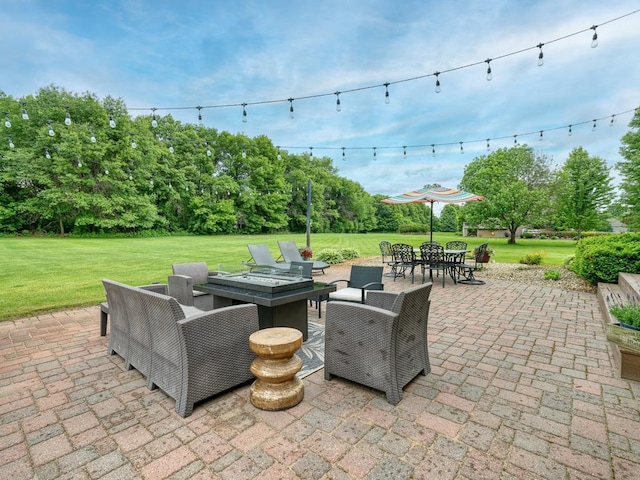 1847 140th Ln NE, Ham Lake, MN 55304 - view of patio featuring an outdoor fire pit and outdoor dining space
