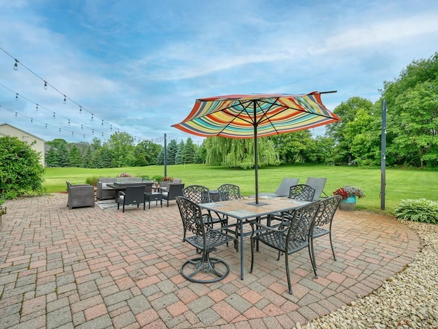 1847 140th Ln NE, Ham Lake, MN 55304 - view of patio / terrace with view of wooded area, outdoor dining area, and an outdoor hangout area