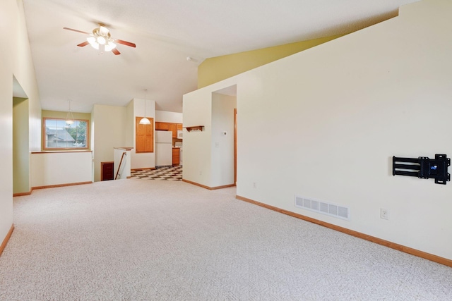 15616 84th St NE, Otsego, MN 55330 - spare room with ceiling fan, light colored carpet, and lofted ceiling