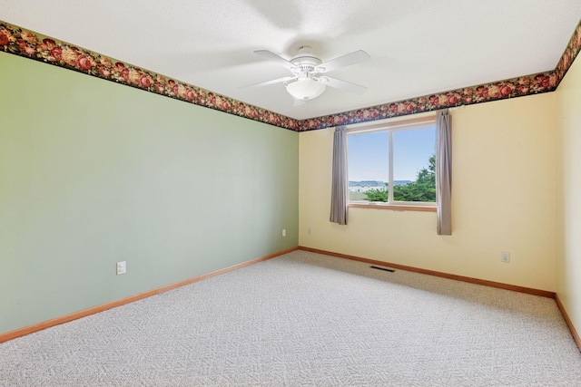15616 84th St NE, Otsego, MN 55330 - carpeted spare room with baseboards and ceiling fan