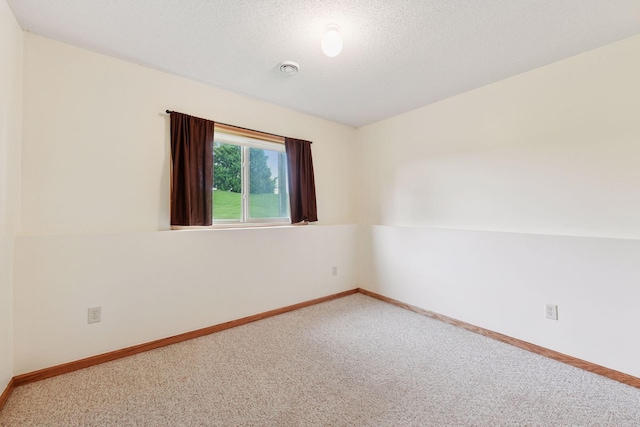 15616 84th St NE, Otsego, MN 55330 - carpeted spare room featuring baseboards and a textured ceiling