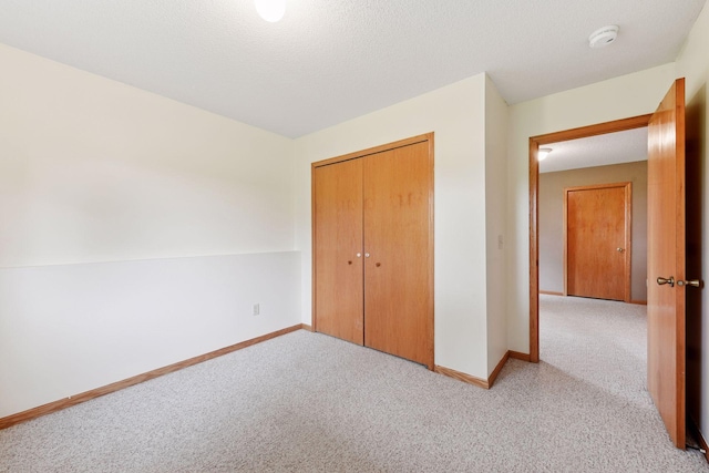 15616 84th St NE, Otsego, MN 55330 - unfurnished bedroom featuring light carpet and a closet