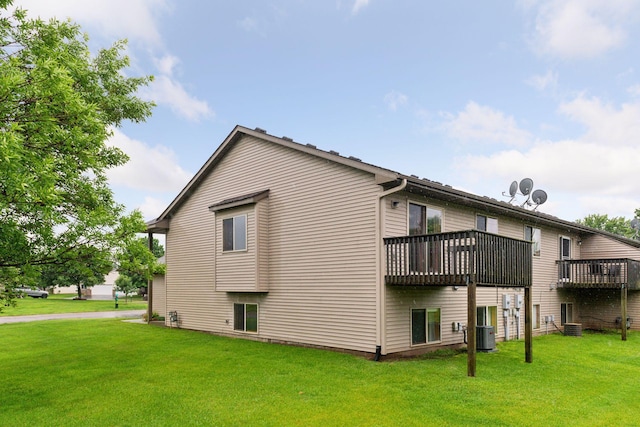 15616 84th St NE, Otsego, MN 55330 - view of property exterior featuring a lawn and a wooden deck