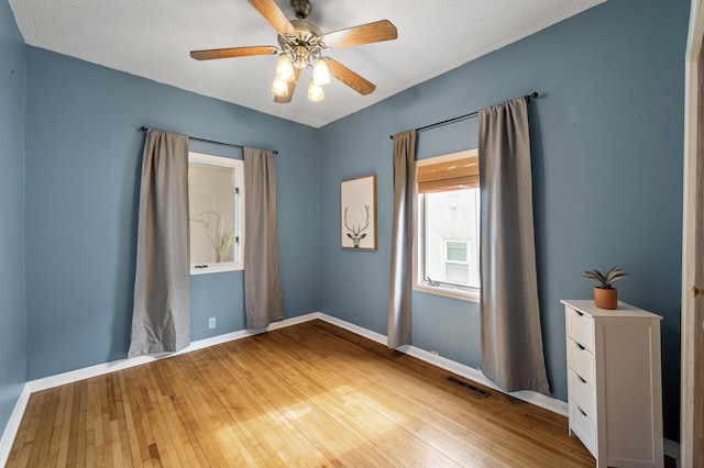 3521 26th St, Minneapolis, MN 55406 - unfurnished room featuring light wood-style flooring and a ceiling fan