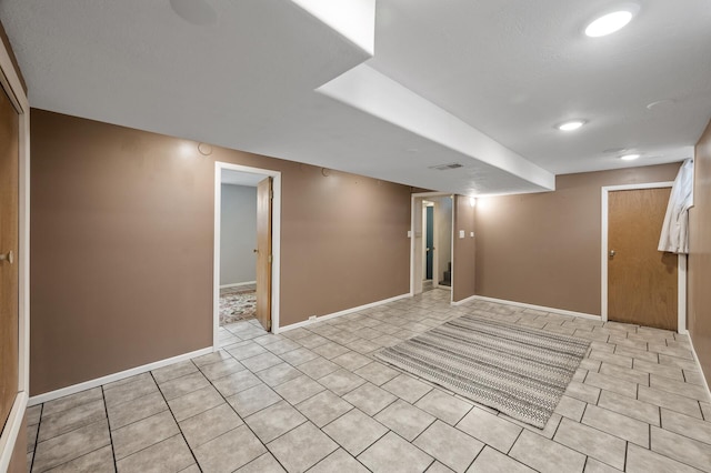 3521 26th St, Minneapolis, MN 55406 - finished below grade area with light tile patterned floors and recessed lighting
