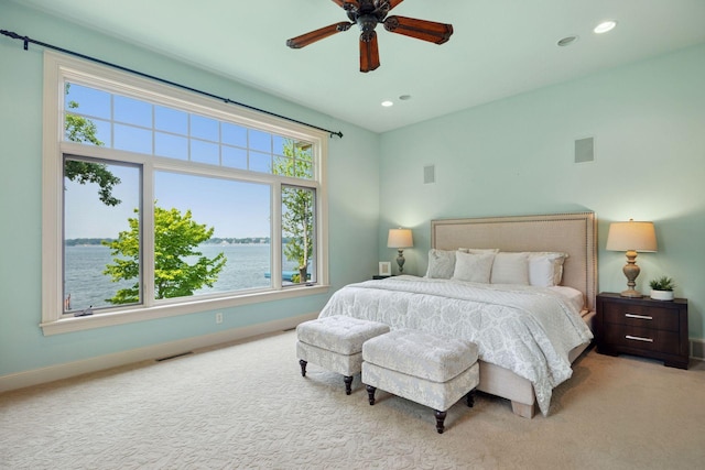 1709 1/2 Pulaski Rd, Buffalo, MN 55313 - carpeted bedroom with recessed lighting, a water view, and a ceiling fan