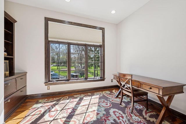 1709 1/2 Pulaski Rd, Buffalo, MN 55313 - home office featuring dark wood-style flooring and recessed lighting