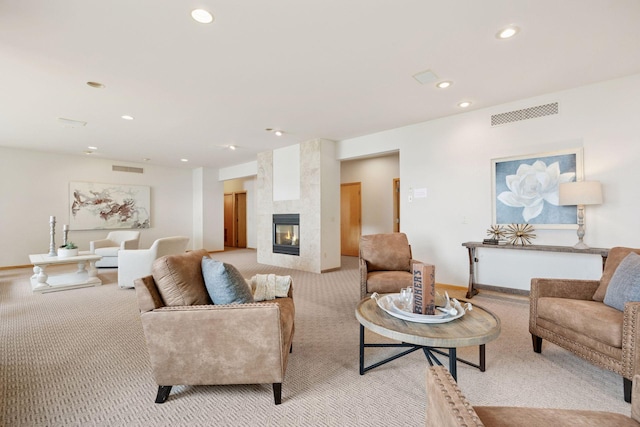 1709 1/2 Pulaski Rd, Buffalo, MN 55313 - living room with light carpet, recessed lighting, and a tile fireplace