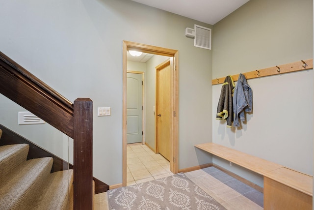 1709 1/2 Pulaski Rd, Buffalo, MN 55313 - mudroom featuring tile patterned floors and baseboards