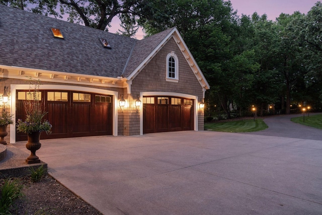 1709 1/2 Pulaski Rd, Buffalo, MN 55313 - view of front of house featuring driveway, a shingled roof, and an attached garage